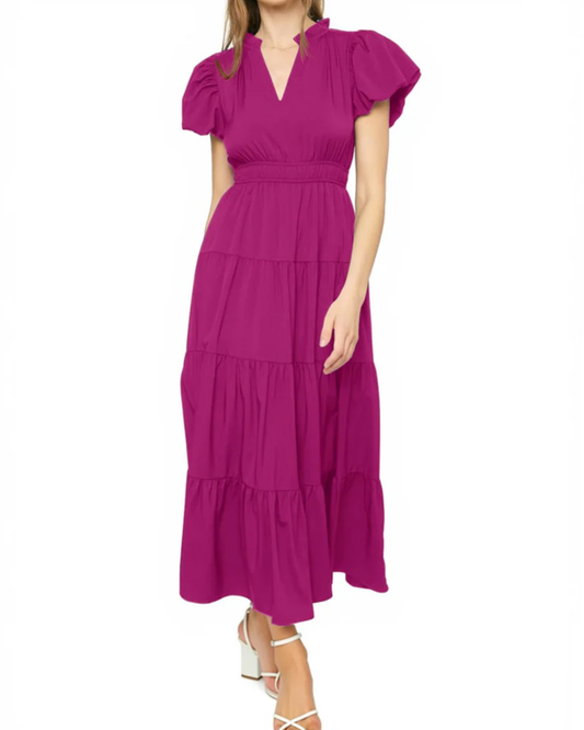 Vestido com mangas bufantes e corte em camadas