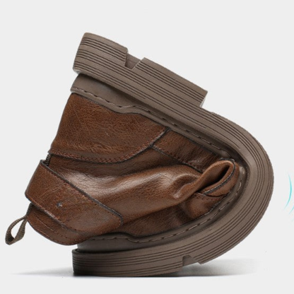 Botas de homem em pele com forro de lã